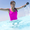 TYR Aquatic Resistance Dumbbells in hand