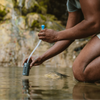 RapidPure Purifier + UltraLight Straw in hand
