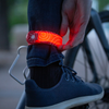 Nite Ize SlapLiT Rechargeable LED Slap Wrap in red on model