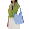 BAGGU Small Nylon Sling in French Blue with model
