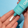 COOLA Classic Face Organic Sunscreen Lotion SPF 50 in hand
