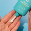 COOLA Classic Body Organic Sunscreen Lotion SPF 30 in hand