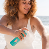 COOLA Classic Body Organic Sunscreen Spray SPF 50 in hand