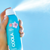 COOLA Classic Body Organic Sunscreen Spray SPF 50 spraying