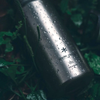 Snow Peak Titanium Aurora Bottle 800 at camp