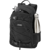 DaKine Youth Grom 13L in Black with water bottle and pocket unzipped