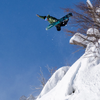 K2 Excavator with rider in air