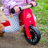 Kinderfeets Tiny Tot Cherry Red with model close up logo