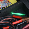 Nite Ize LED Mini Glowstick glowing in trunk
