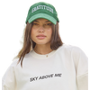 Spiritual Gangster Gratitude Dad Hat on model.